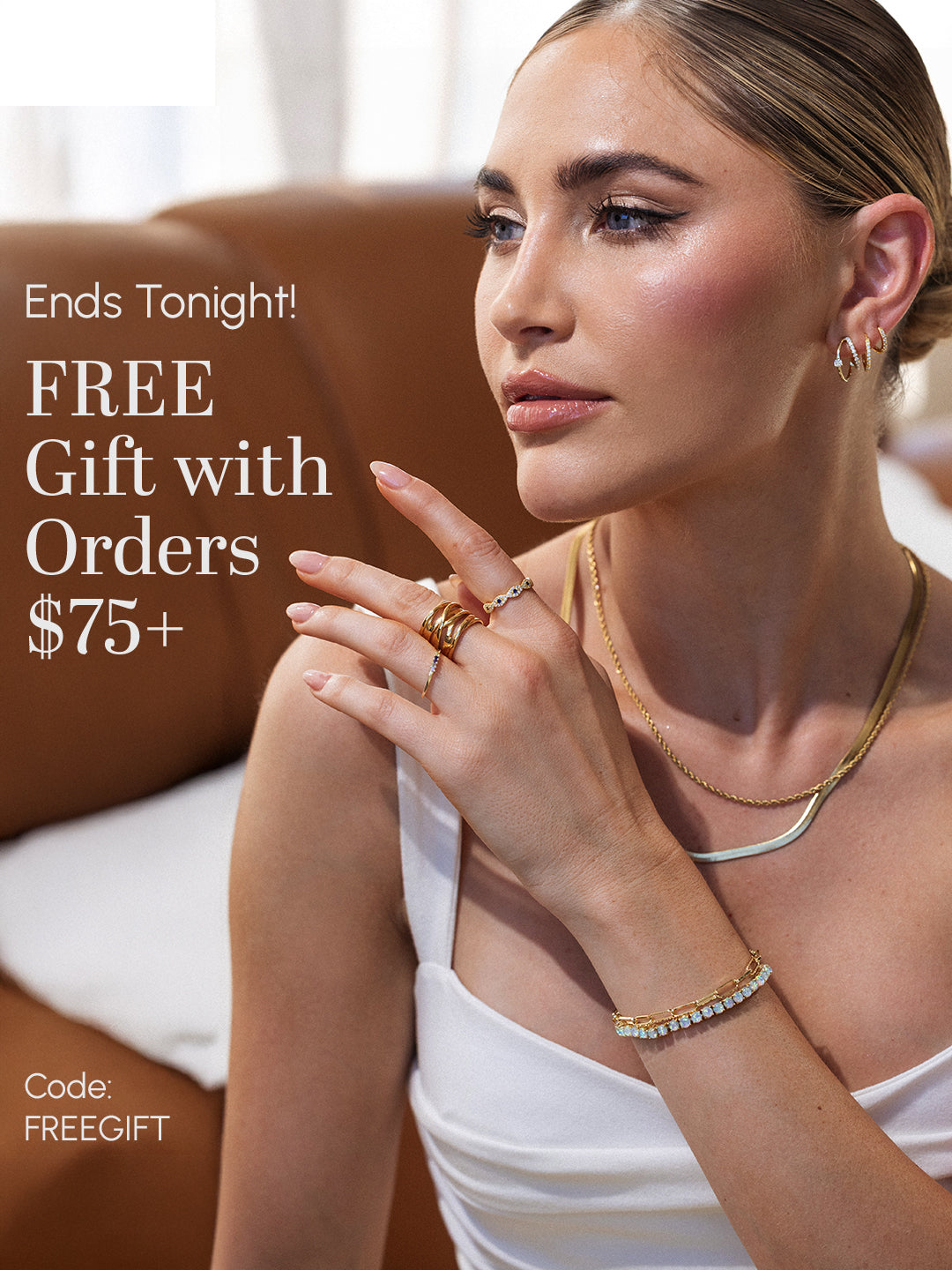Woman wearing gold jewelry with promotional text overlay