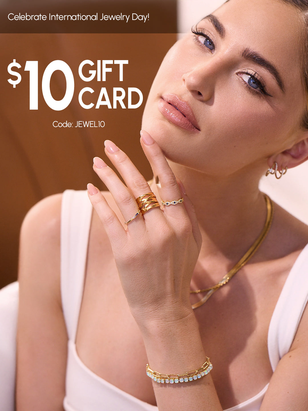 Woman wearing gold jewelry with a $10 gift card offer on a brown background