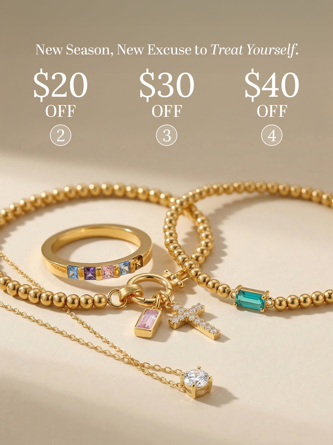 Gold jewelry set with discounts on a beige background