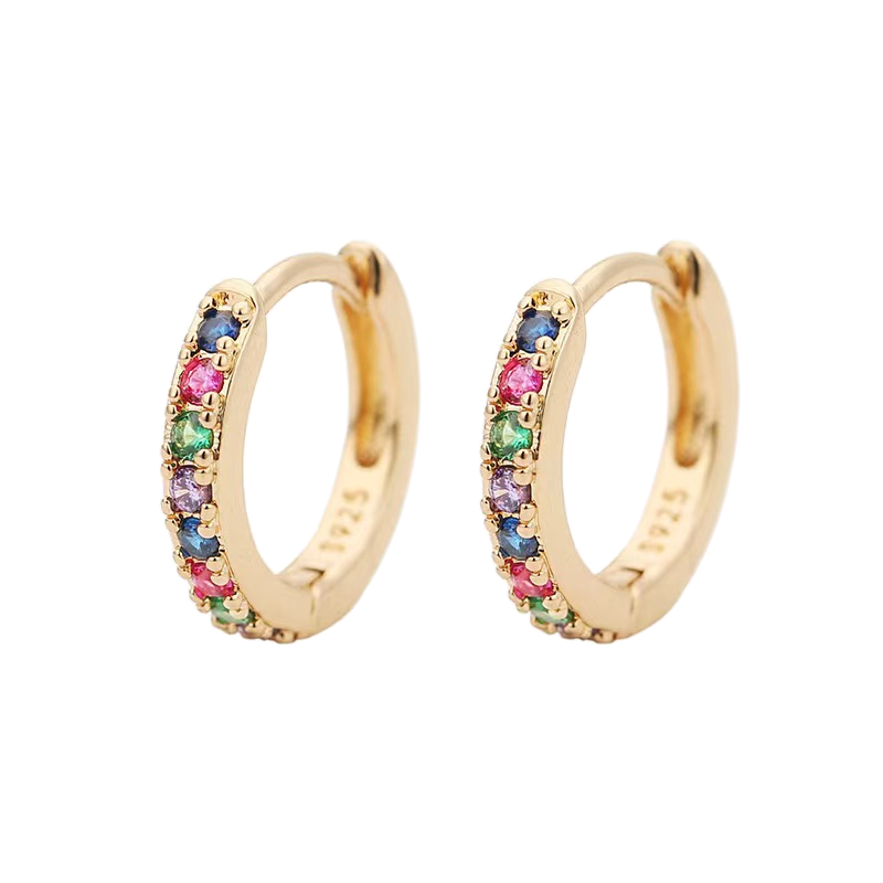 A pair of gold huggie hoop earrings adorned with multicolored gemstones.