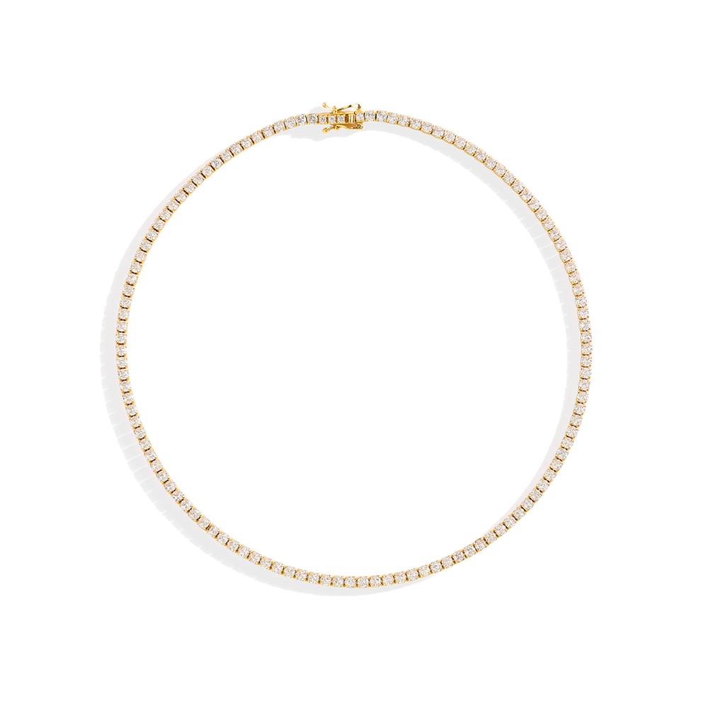 Gold necklace on a white background