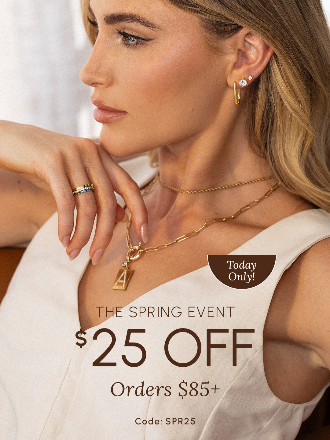 Woman wearing layered gold necklaces, rings, and earrings with an initial pendant, featuring promotional text “$25 OFF Orders $85+,” “The Spring Event,” “Today Only,” and code “SPR25.”