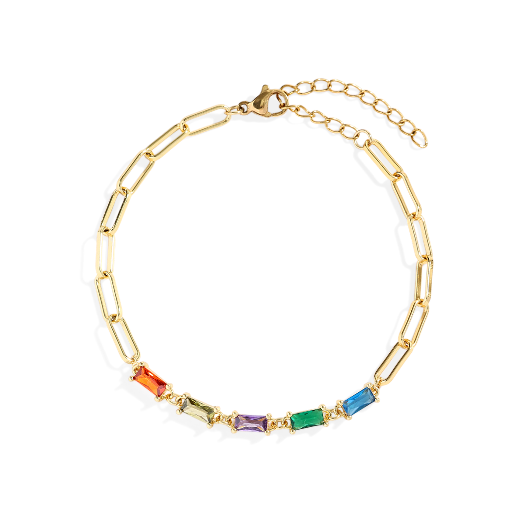 Gold bracelet with colorful gemstones on a white background
