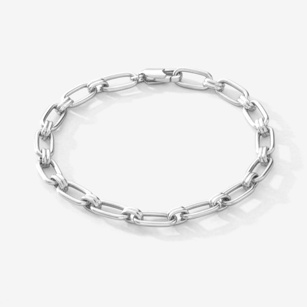 Silver chain bracelet on a white background