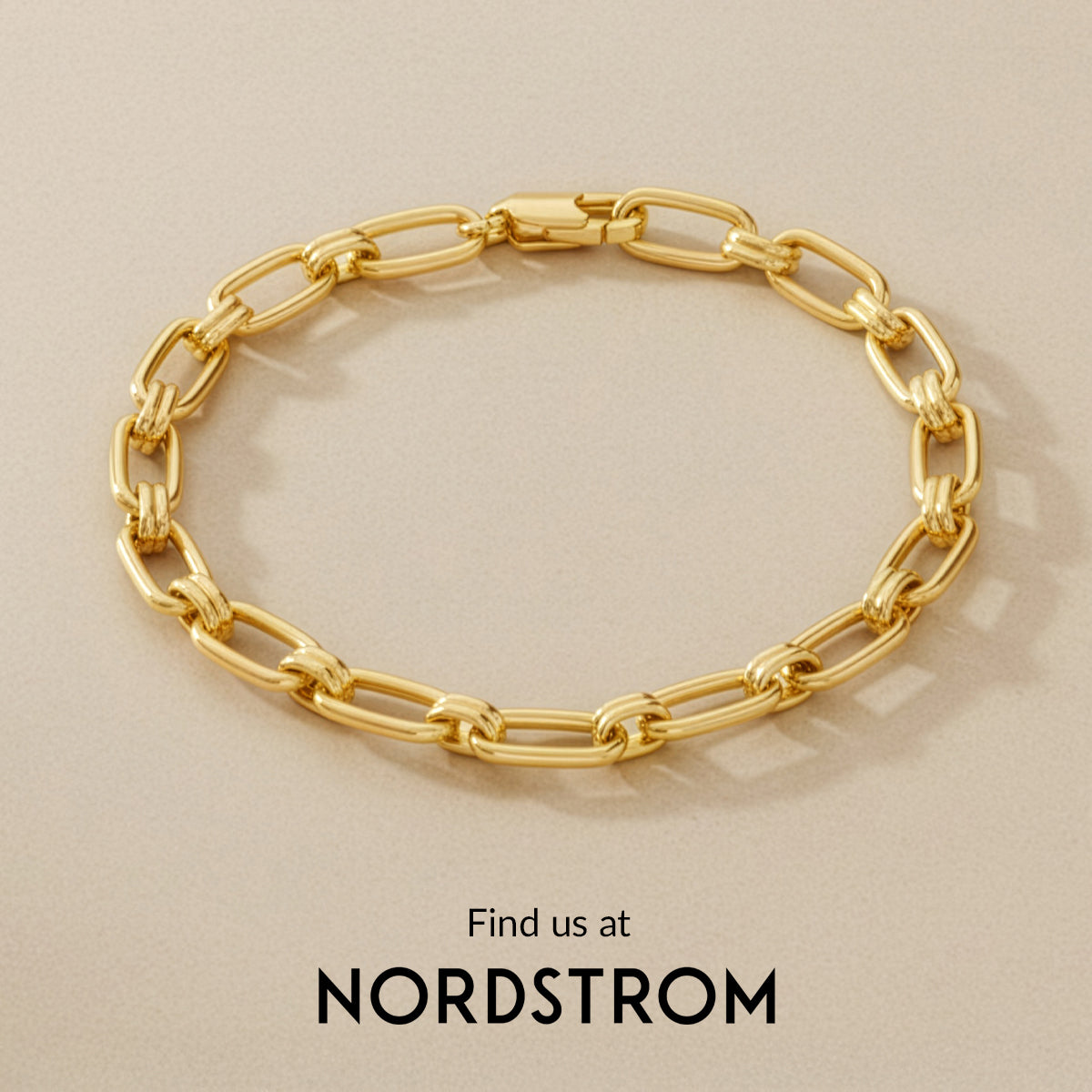 Gold chain bracelet on a beige background with Nordstrom branding.