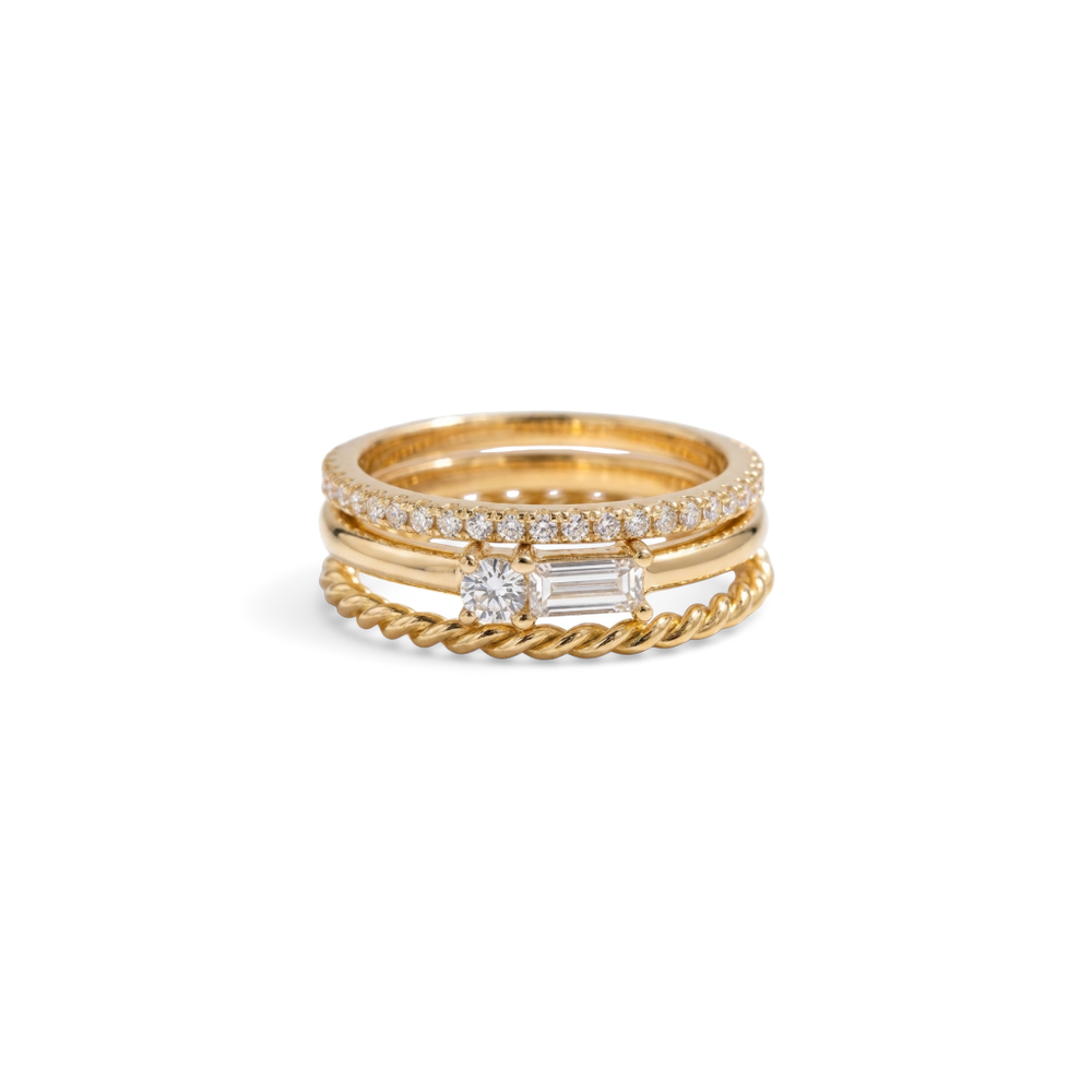 Classic Ring Stack: three gold stacking rings shown together on a white background