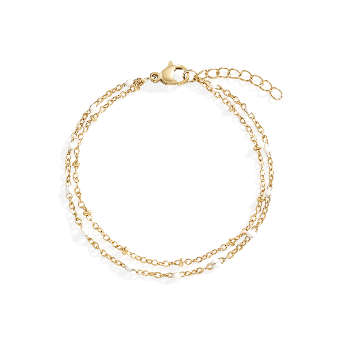 Gold chain bracelet on a white background
