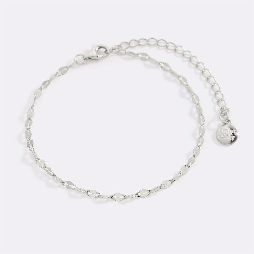 Silver chain bracelet on a white background