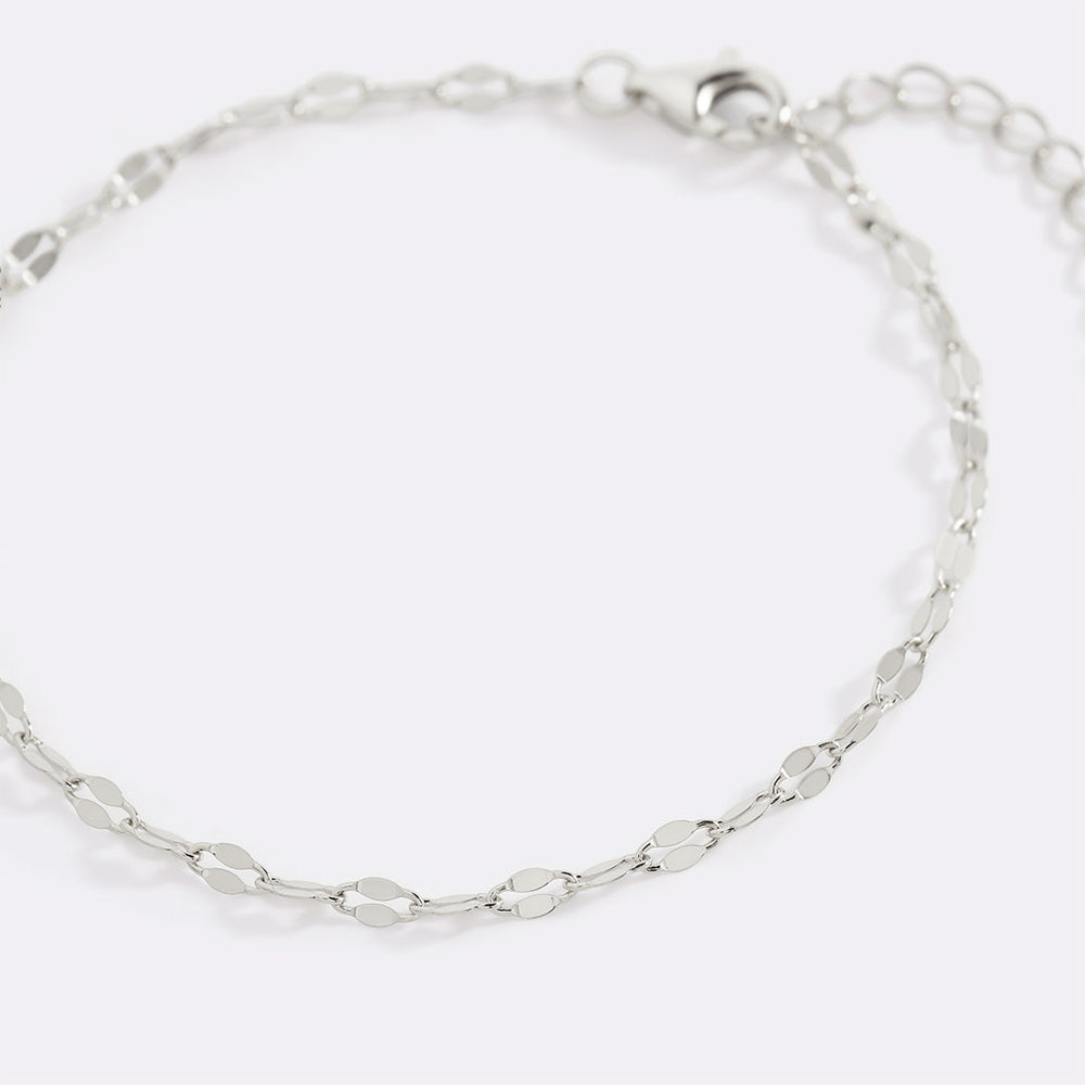 Silver chain bracelet on a white background