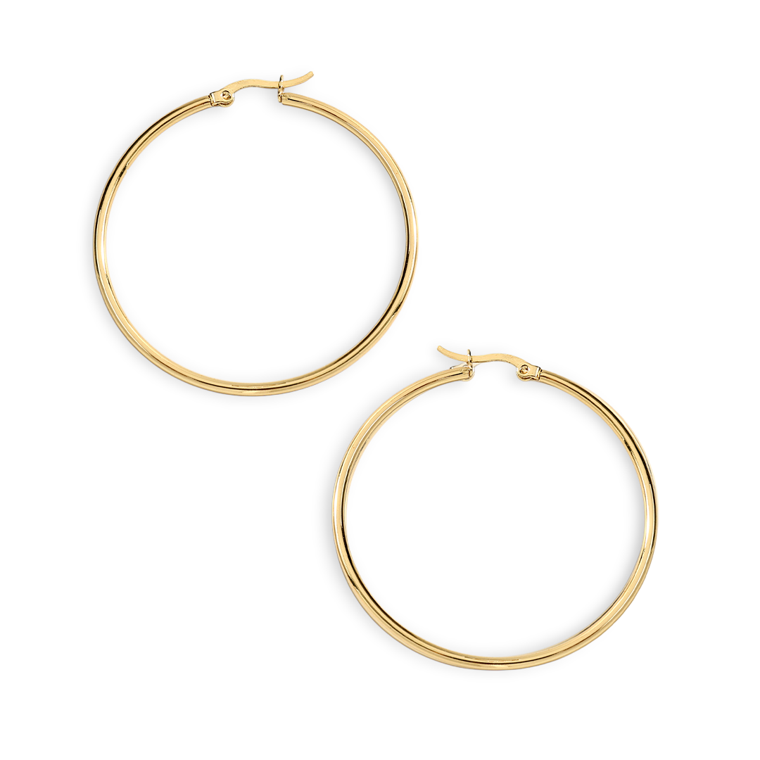 Gold hoop earrings on a light gray background
