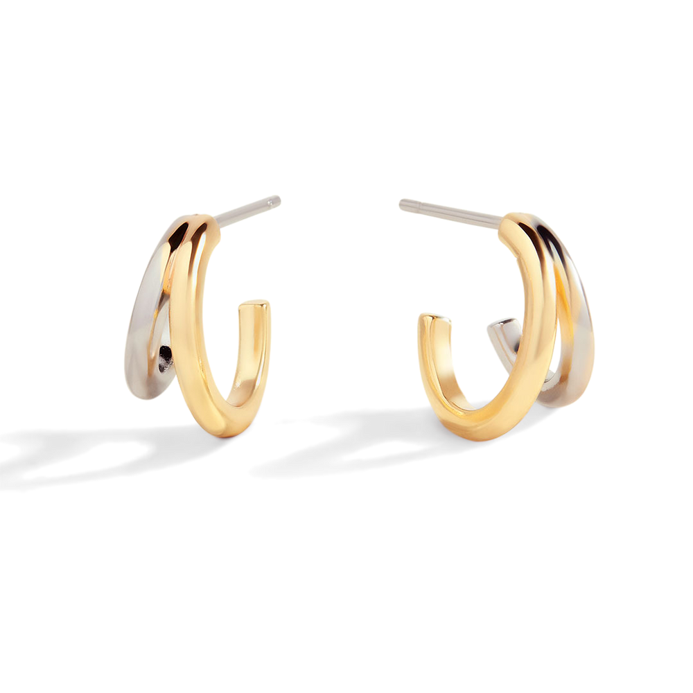 Pair of gold hoop earrings on a white background