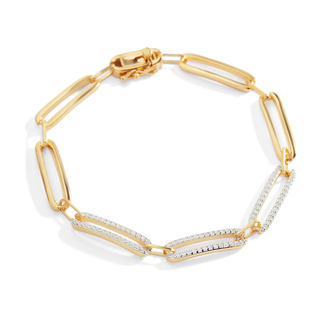 Gold bracelet with diamond accents on a white background