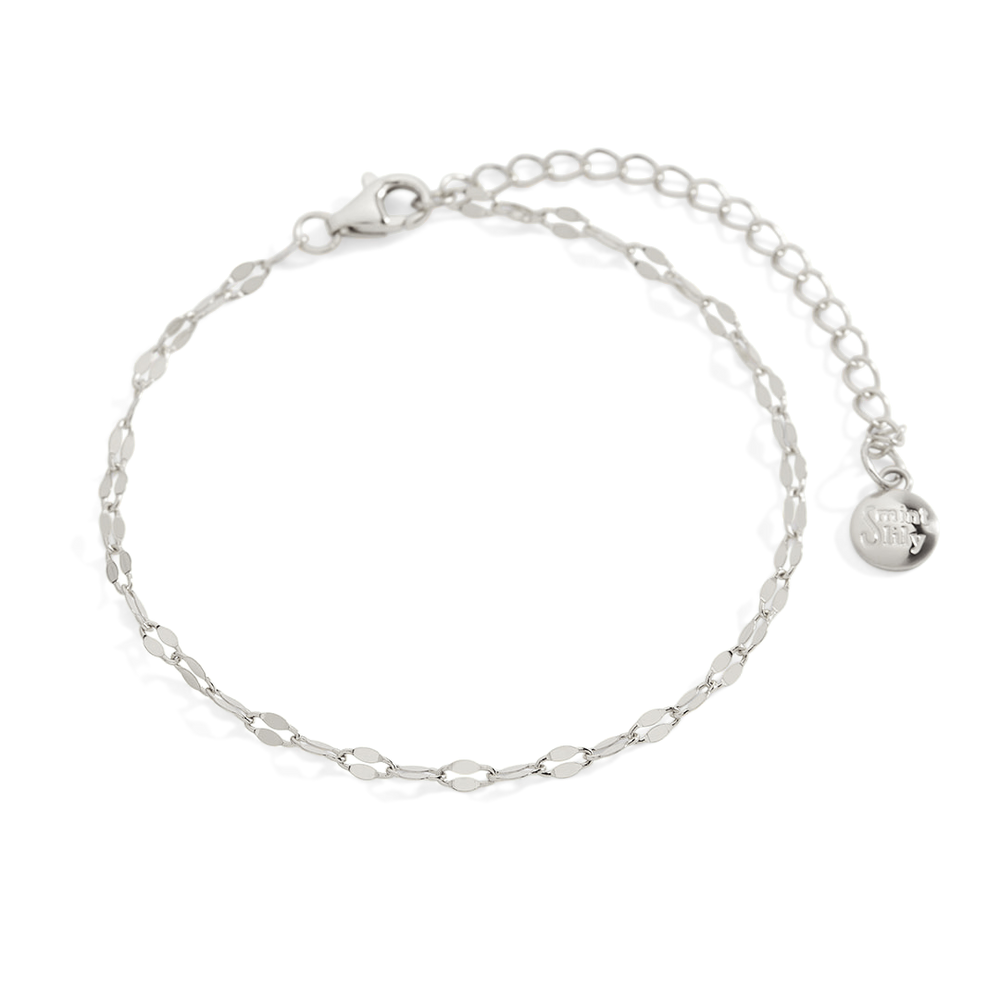 Silver chain bracelet on a white background