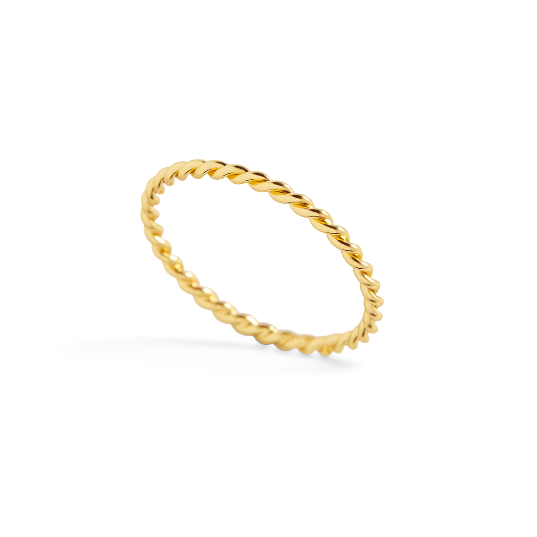 A delicate gold-colored braided ring on a black background.