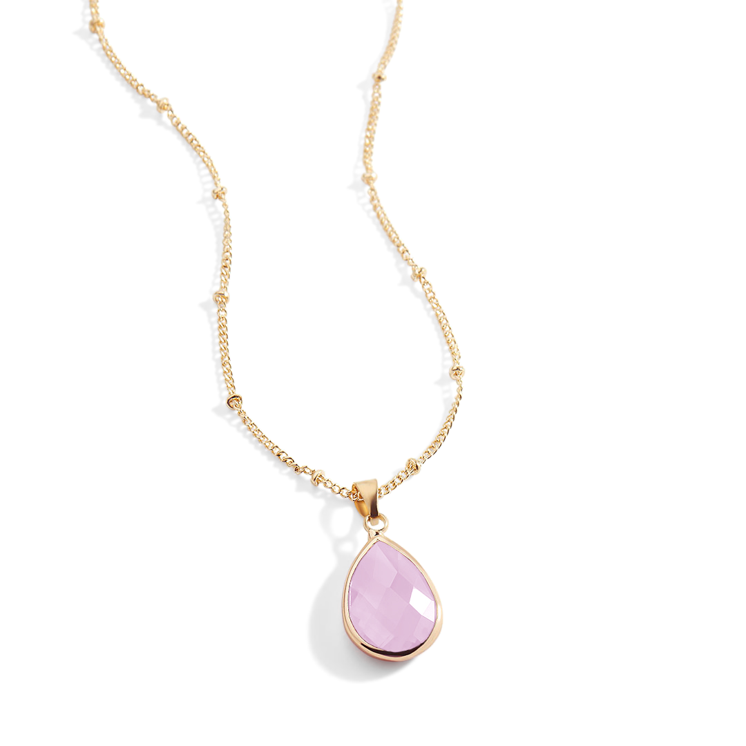 Necklace with a pink teardrop pendant on a white background