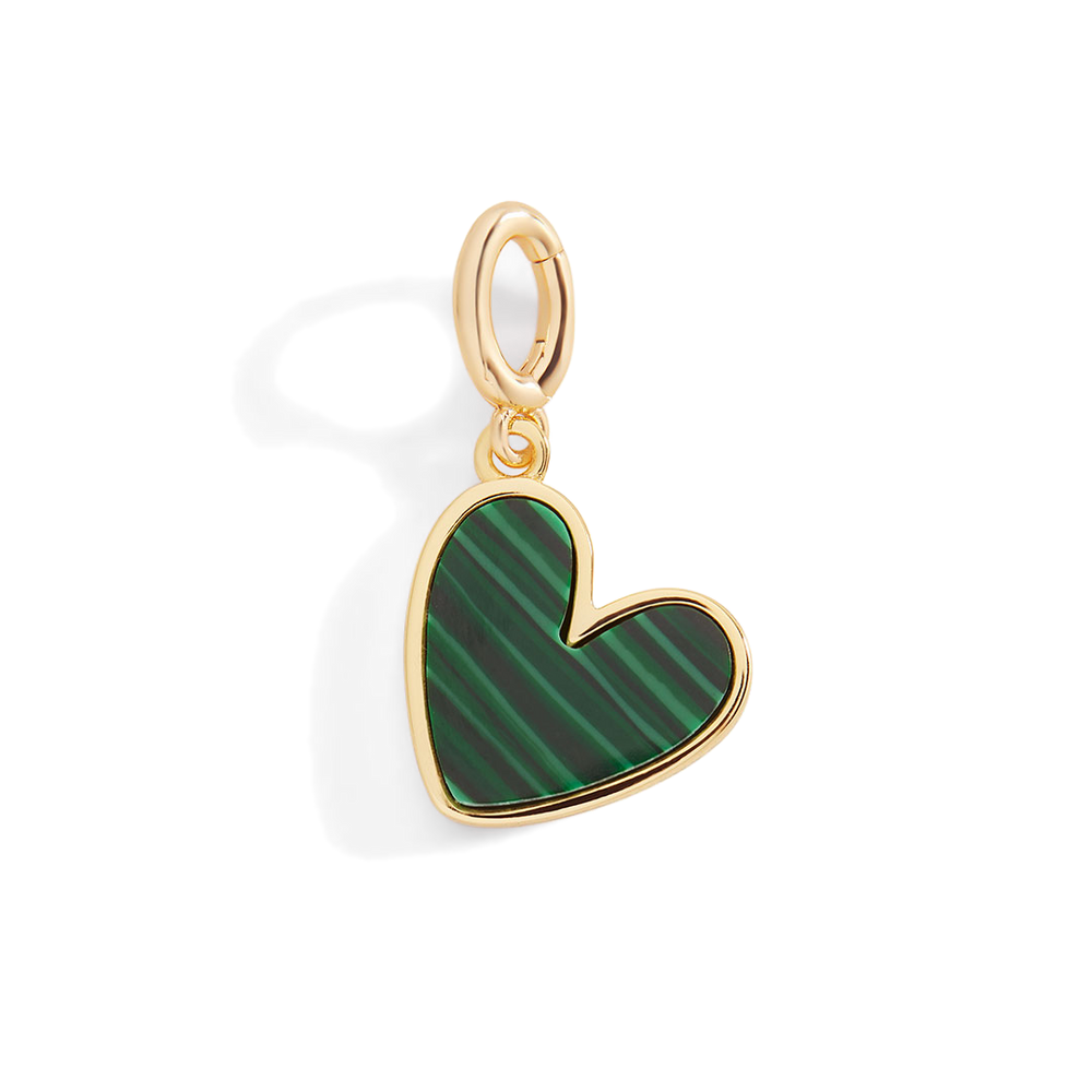 Heart-shaped pendant with green pattern and gold frame on a light gray background