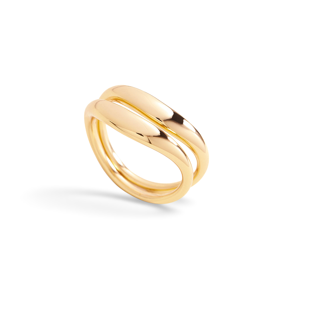 Gold ring on a light gray background