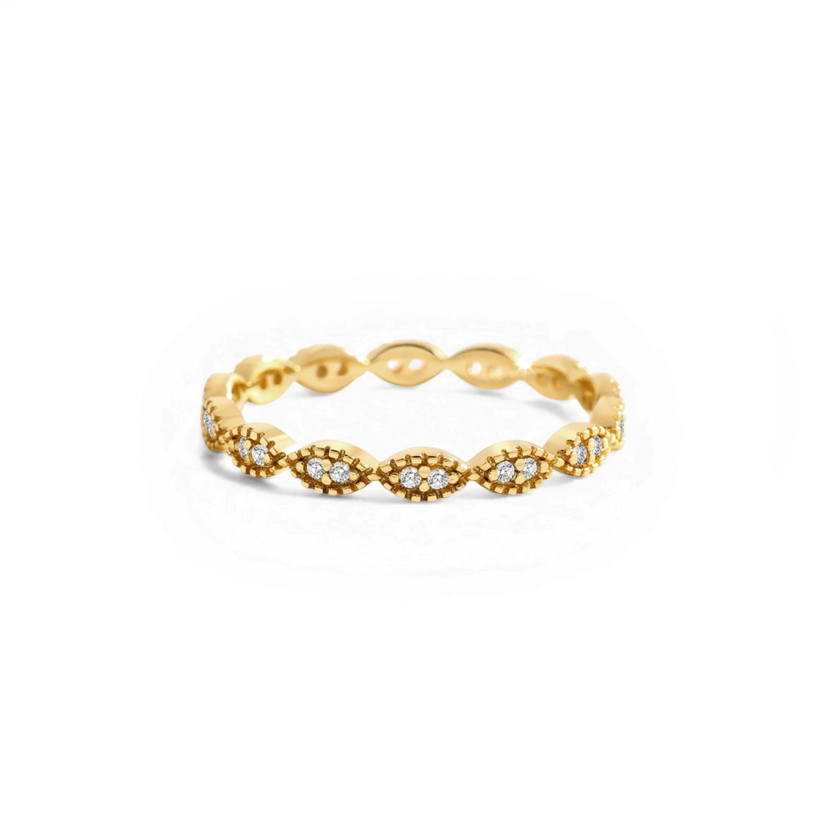 Gold ring with diamond accents on a white background