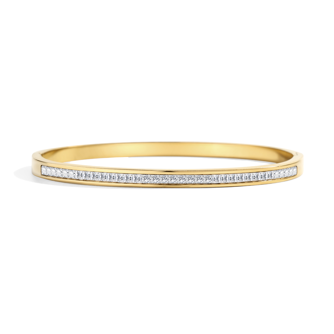 Gold bracelet with small diamonds on a white background