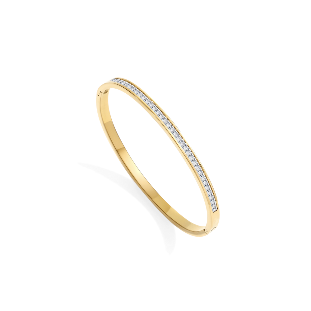 Gold bracelet with embedded diamonds on a light gray background