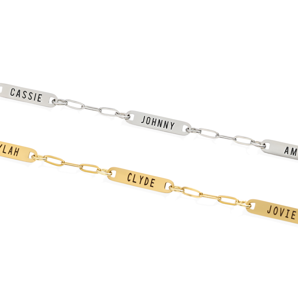 Two bracelets with engraved names on a white background