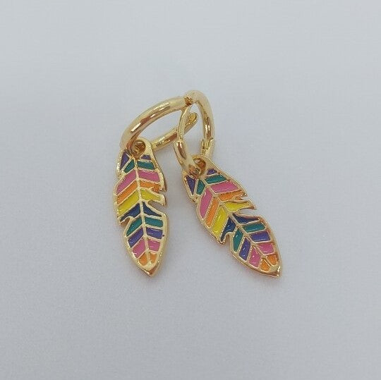 A pair of gold-plated earrings shaped like feathers with a multicolored rainbow pattern.