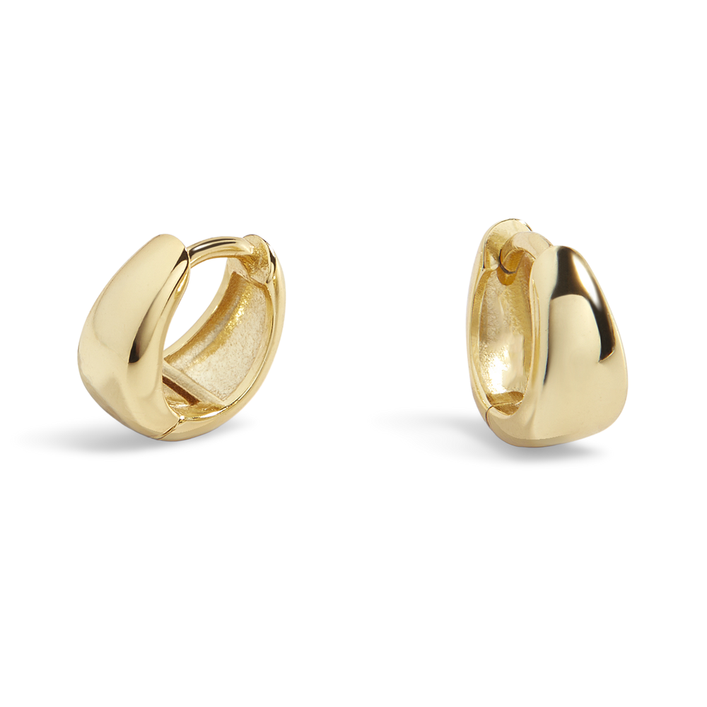 A pair of gold huggie hoop earrings with a teardrop design on a black background.