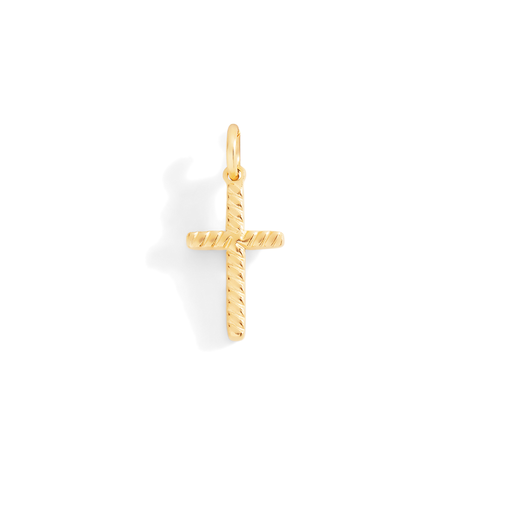 Gold cross pendant on a light gray background