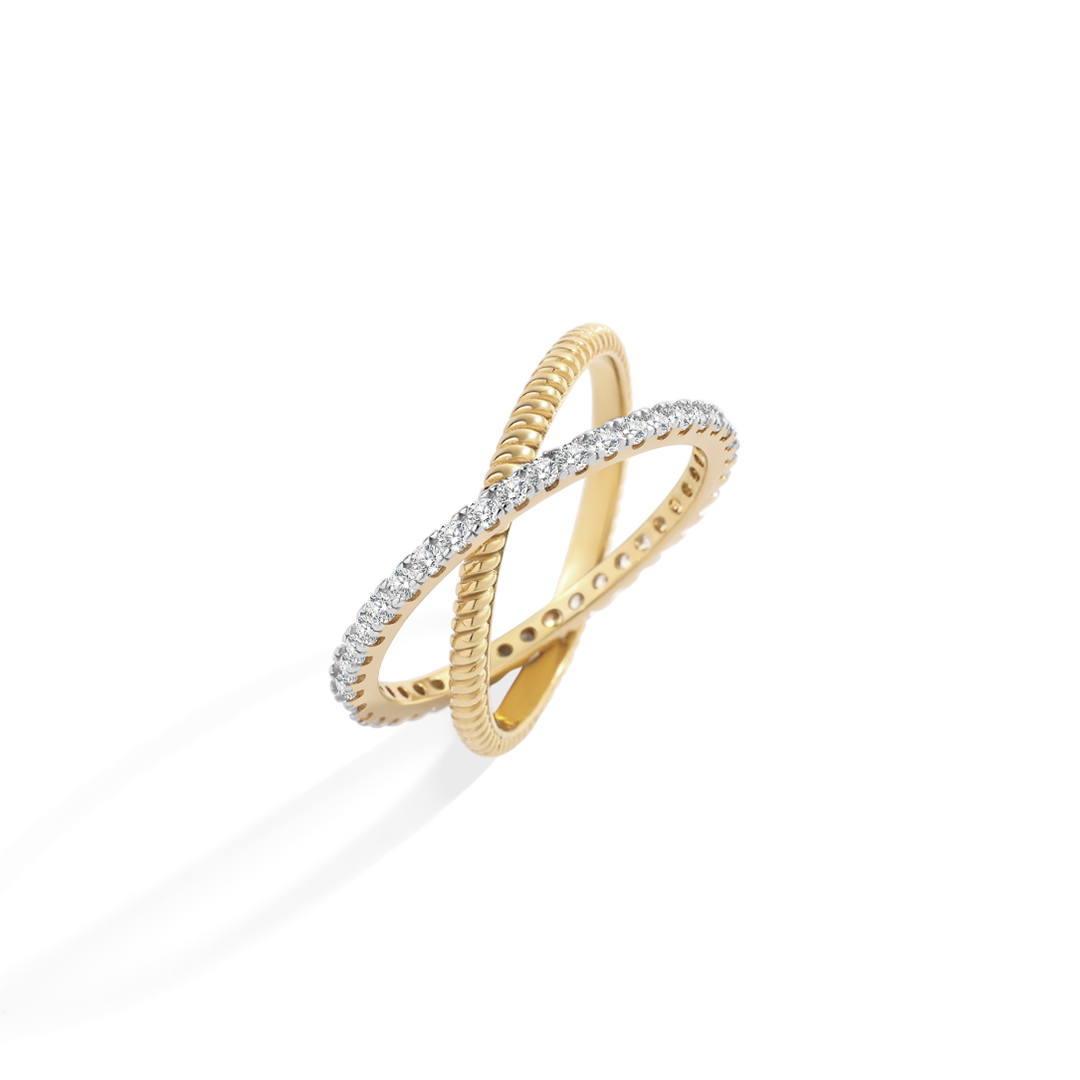 Gold ring with diamond accents on a white background