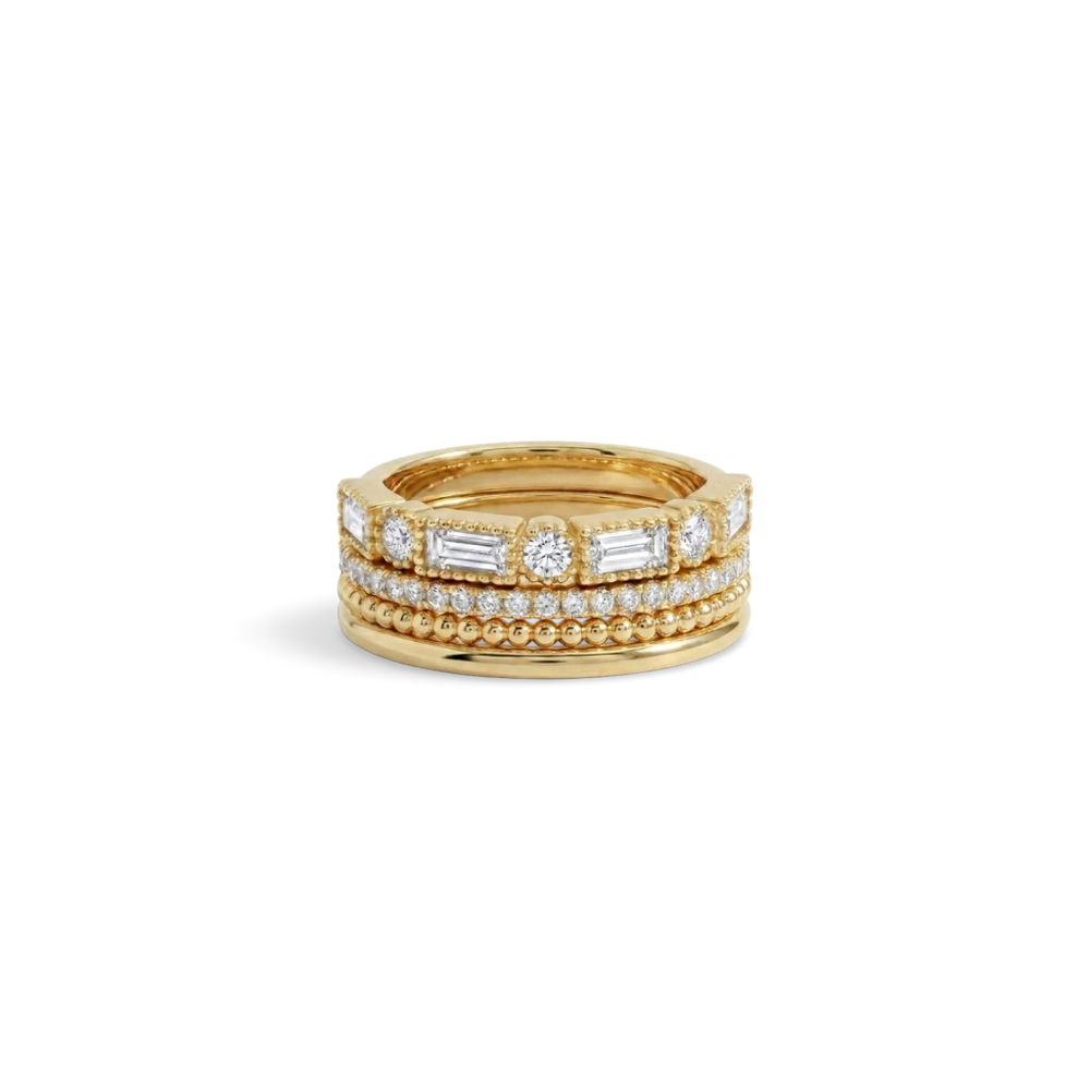 Vintage Maximalist Ring Stack: four gold stacking rings shown together on a white background