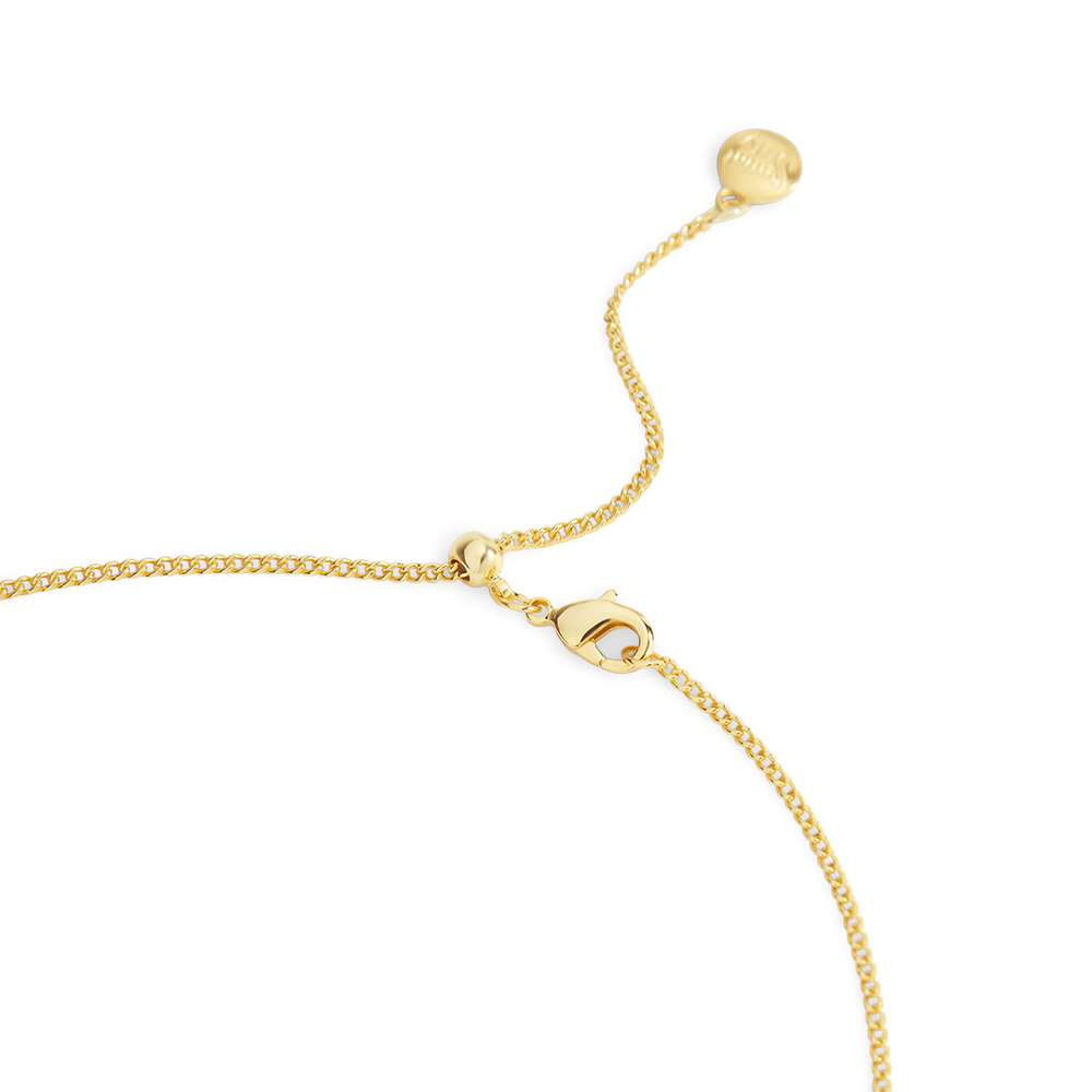 Gold bracelet on a white background