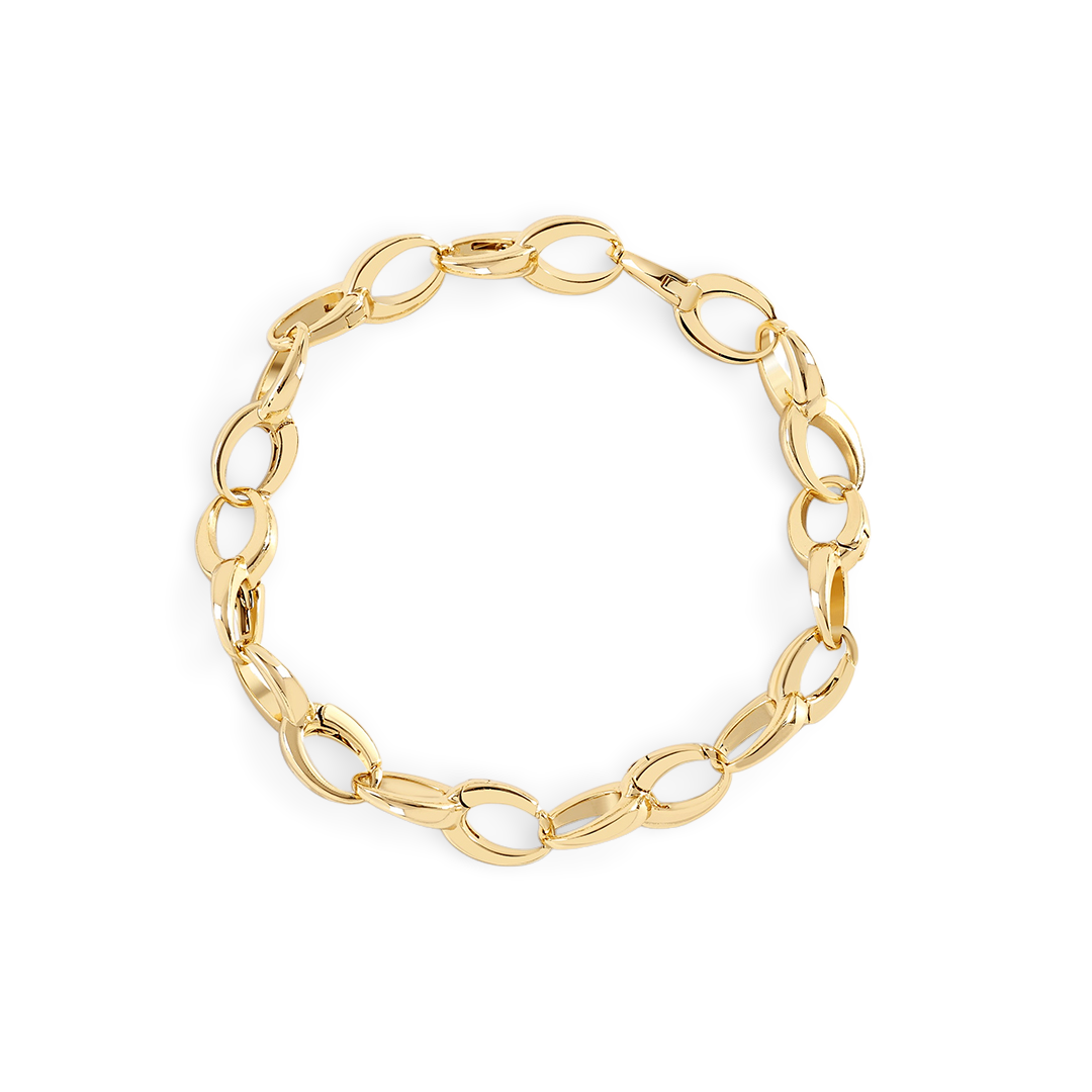 Gold chain bracelet on a light gray background