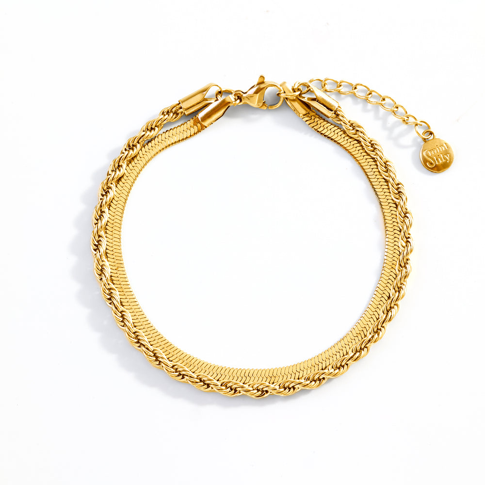 Gold bracelet on a white background