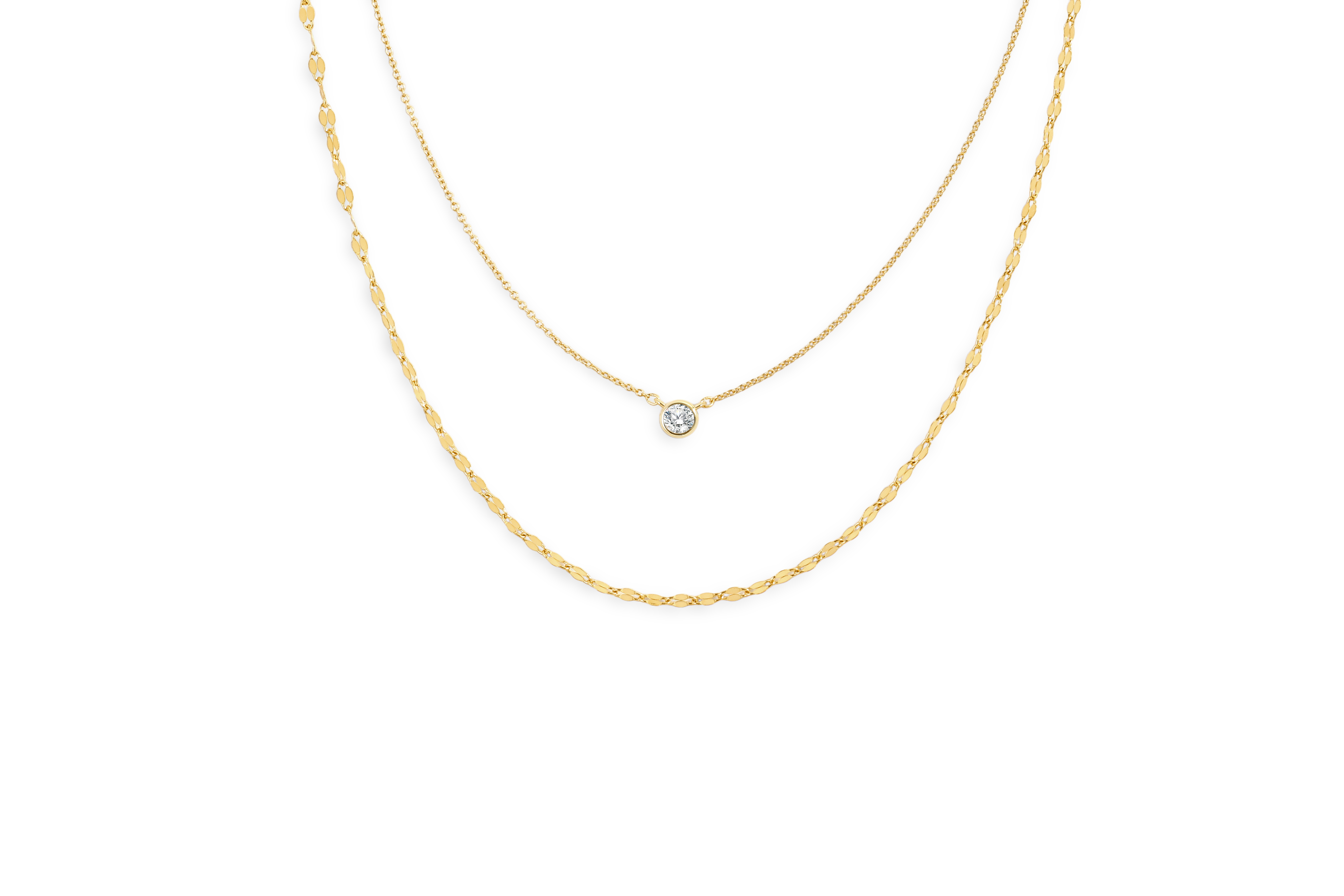 Two gold necklaces on a white background