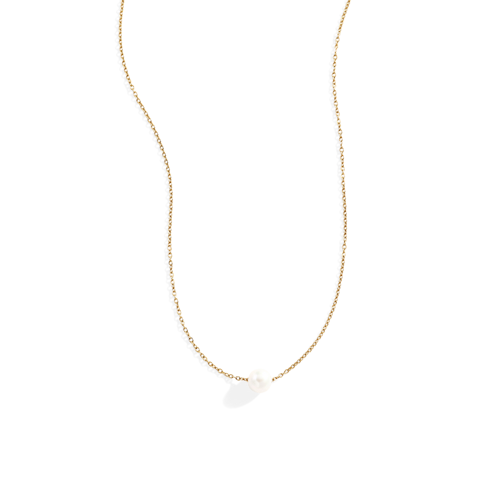Gold necklace with a single pearl pendant on a light gray background