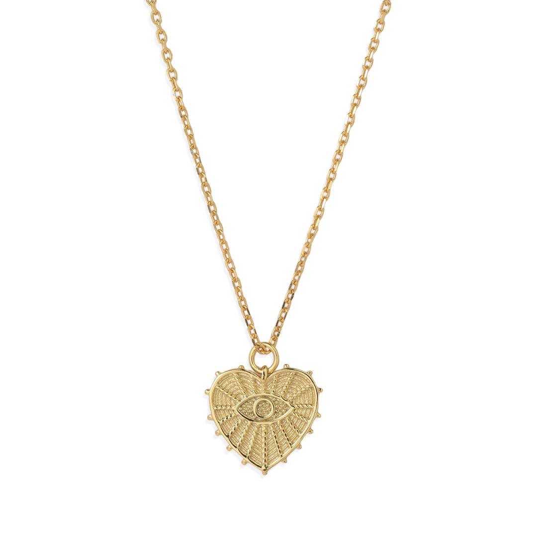 A gold-colored pendant necklace with a heart-shaped charm featuring an evil eye design in the center, displayed against a white background.