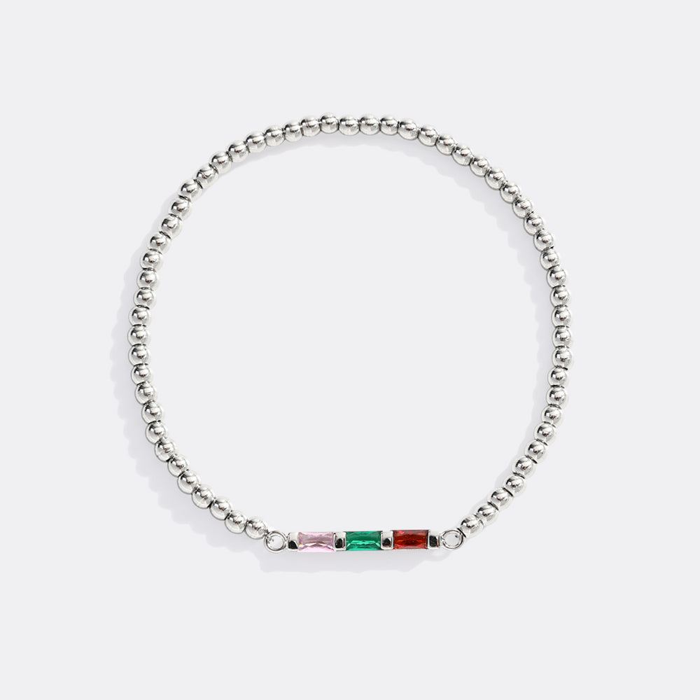 Silver bracelet with colorful gemstones on a white background