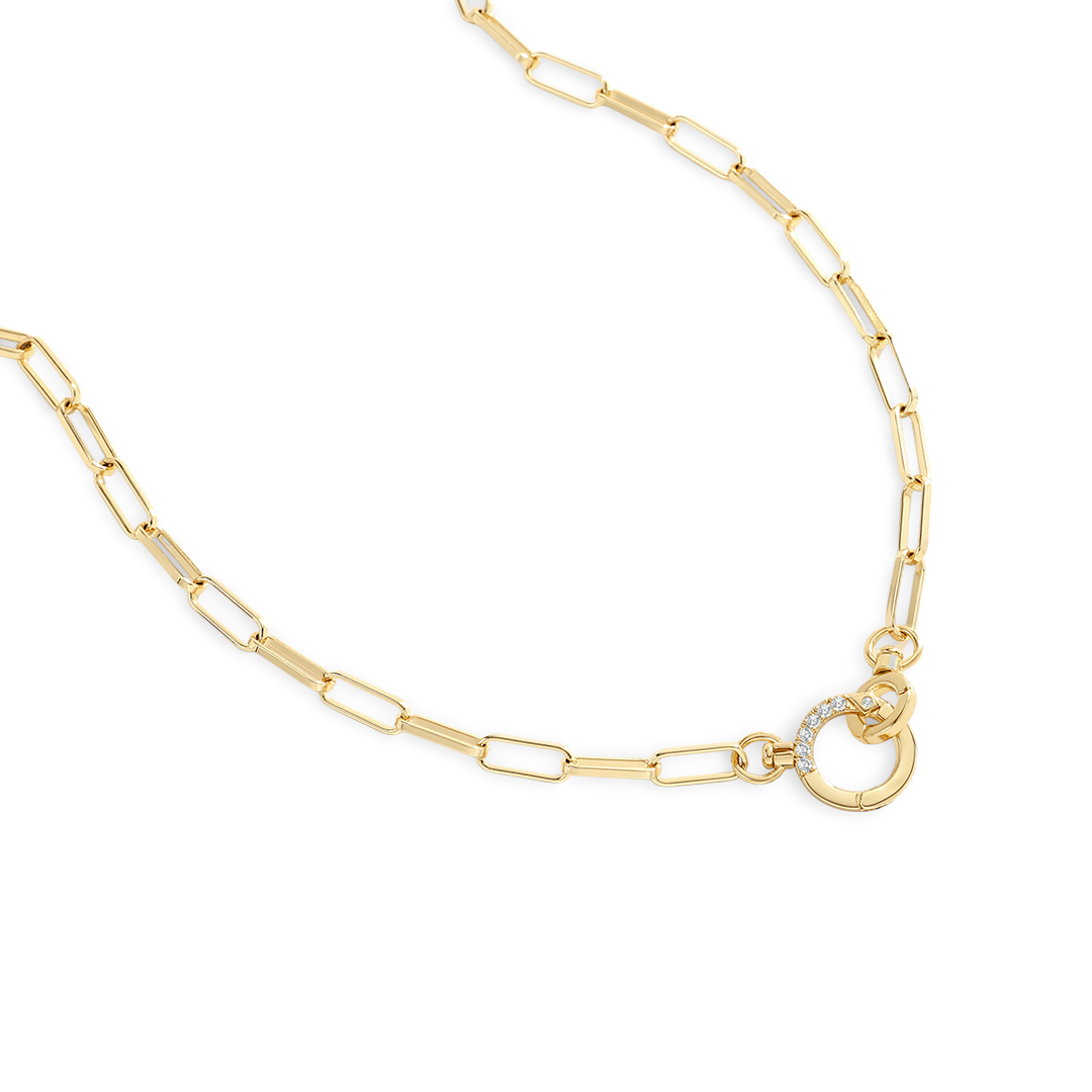 Gold chain necklace with a unique clasp on a white background