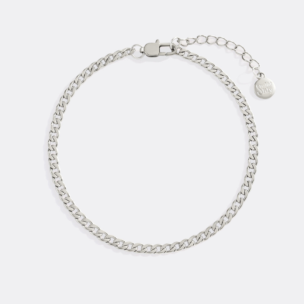 Silver chain bracelet on a white background