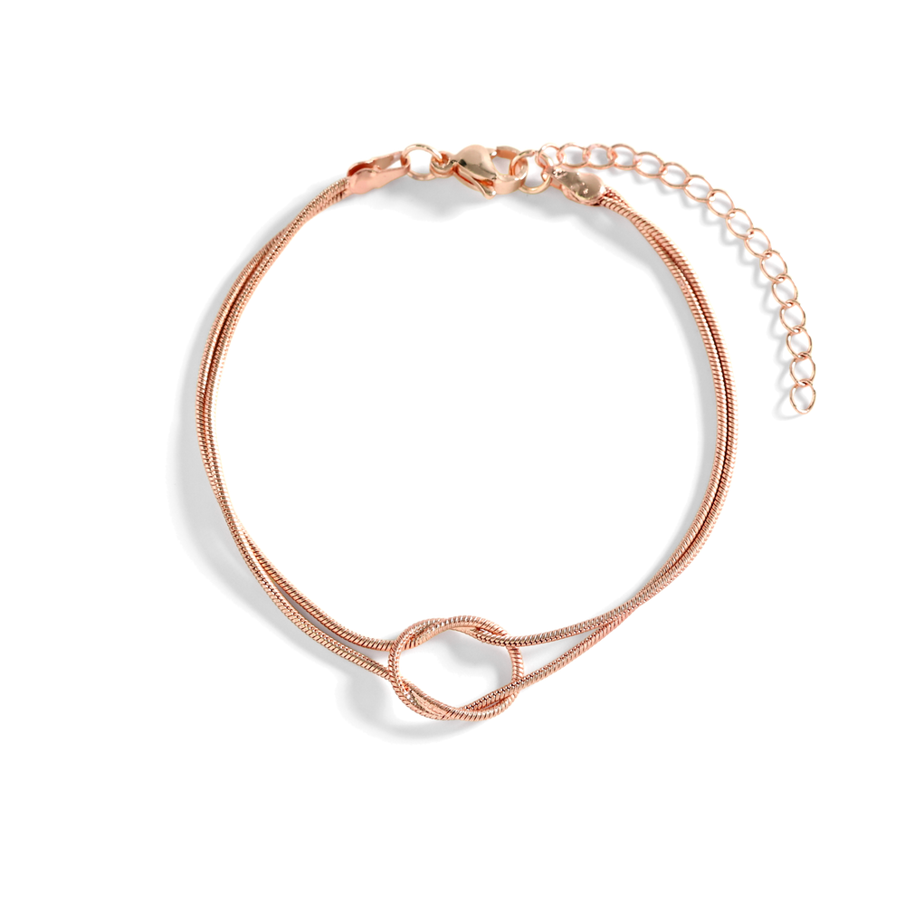 Rose gold bracelet on a white background