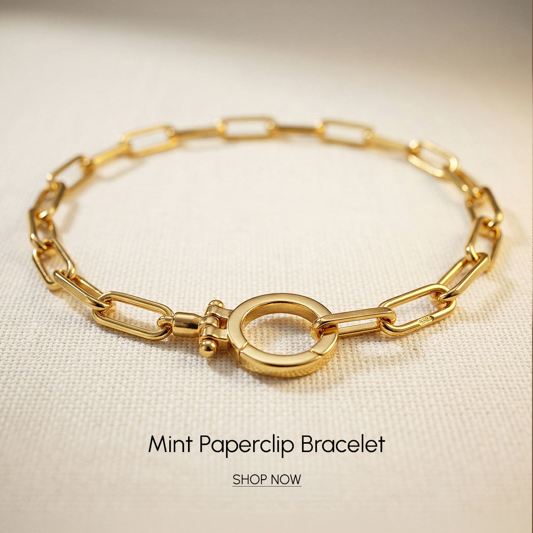 Gold paperclip bracelet on a beige fabric background with 'Mint Paperclip Bracelet' text.