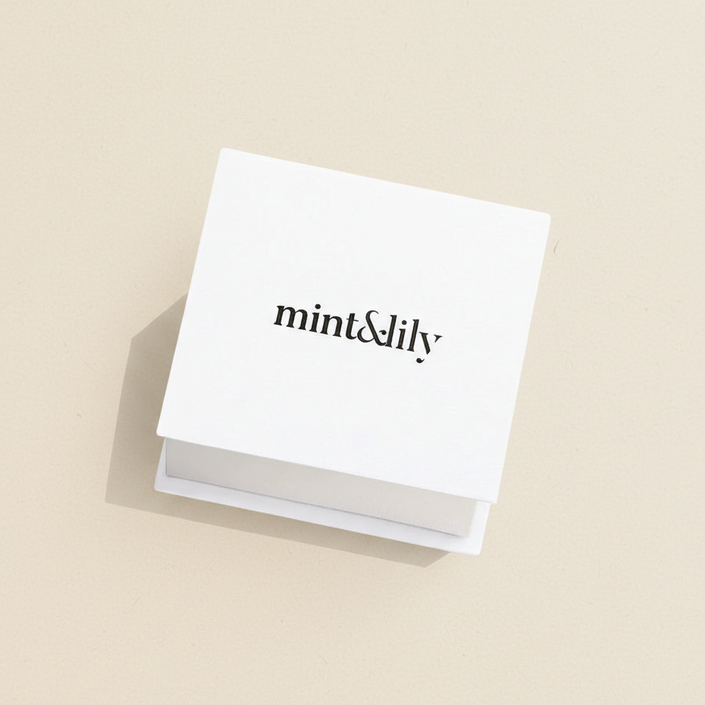 White card with 'mint&lily' text on a beige background