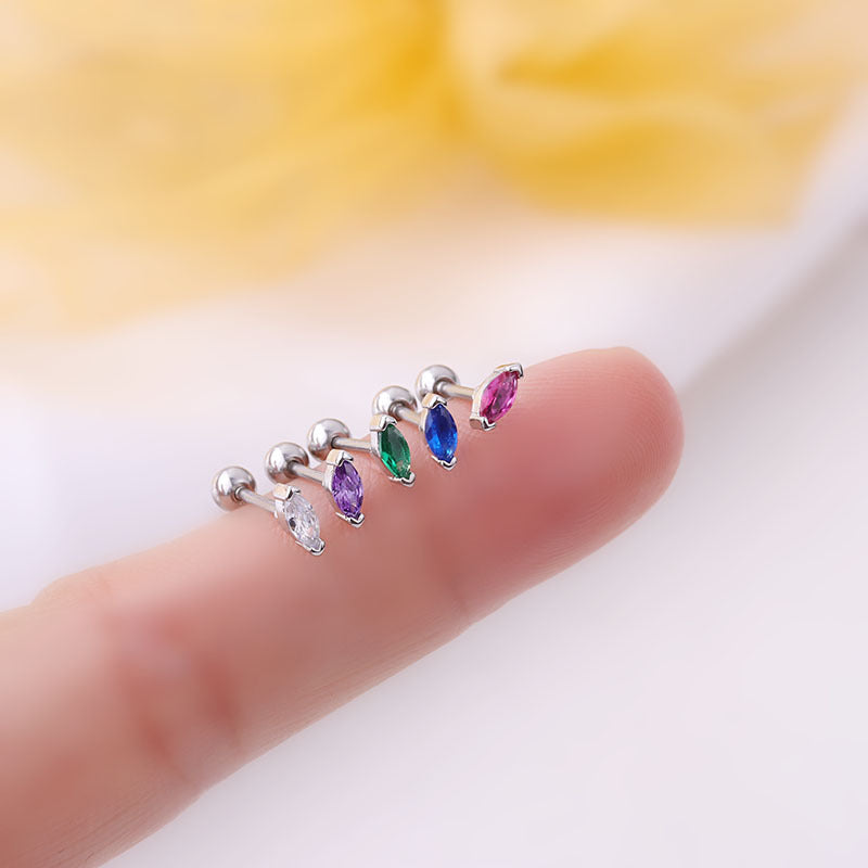 A pair of sleeper stud earrings with marquise-cut gemstones, gold-colored metal, and a clear and pink gemstone.