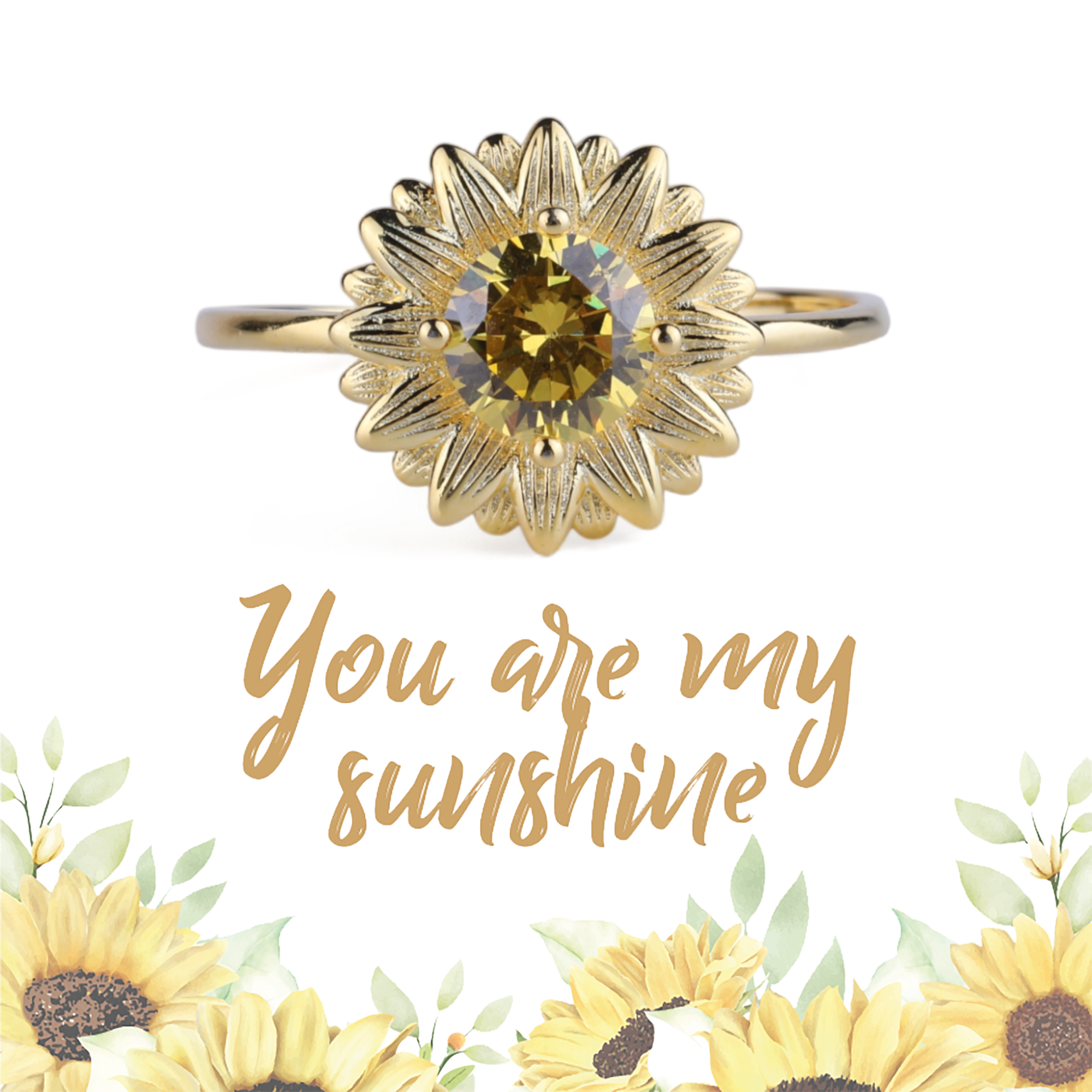 A ring featuring a multicolored sunflower design set in a gold-colored band, with the phrase 'You are my sunshine' written in gold letters.